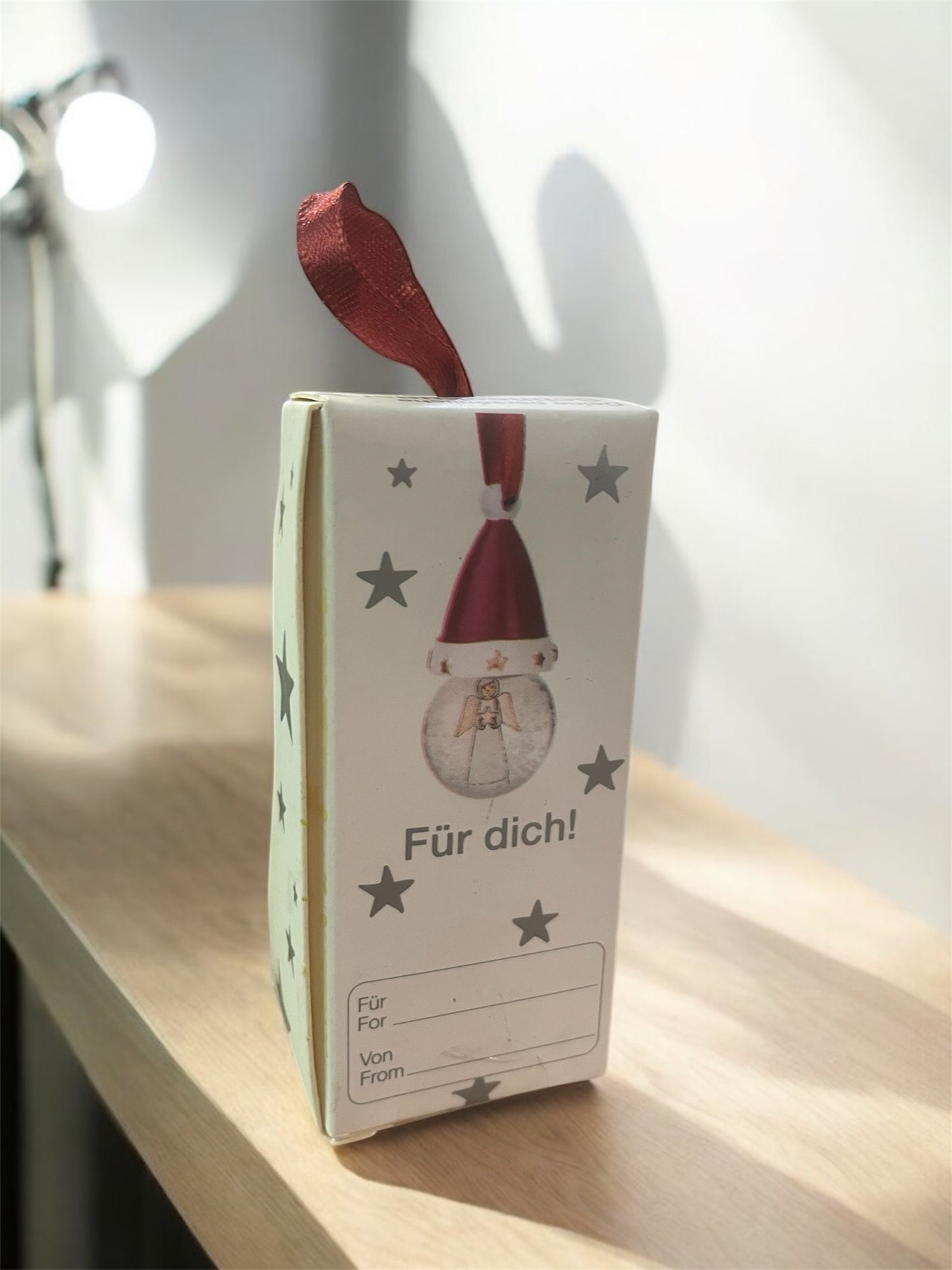 Christmas ornament with a santa hat in a gift box (8 cm)