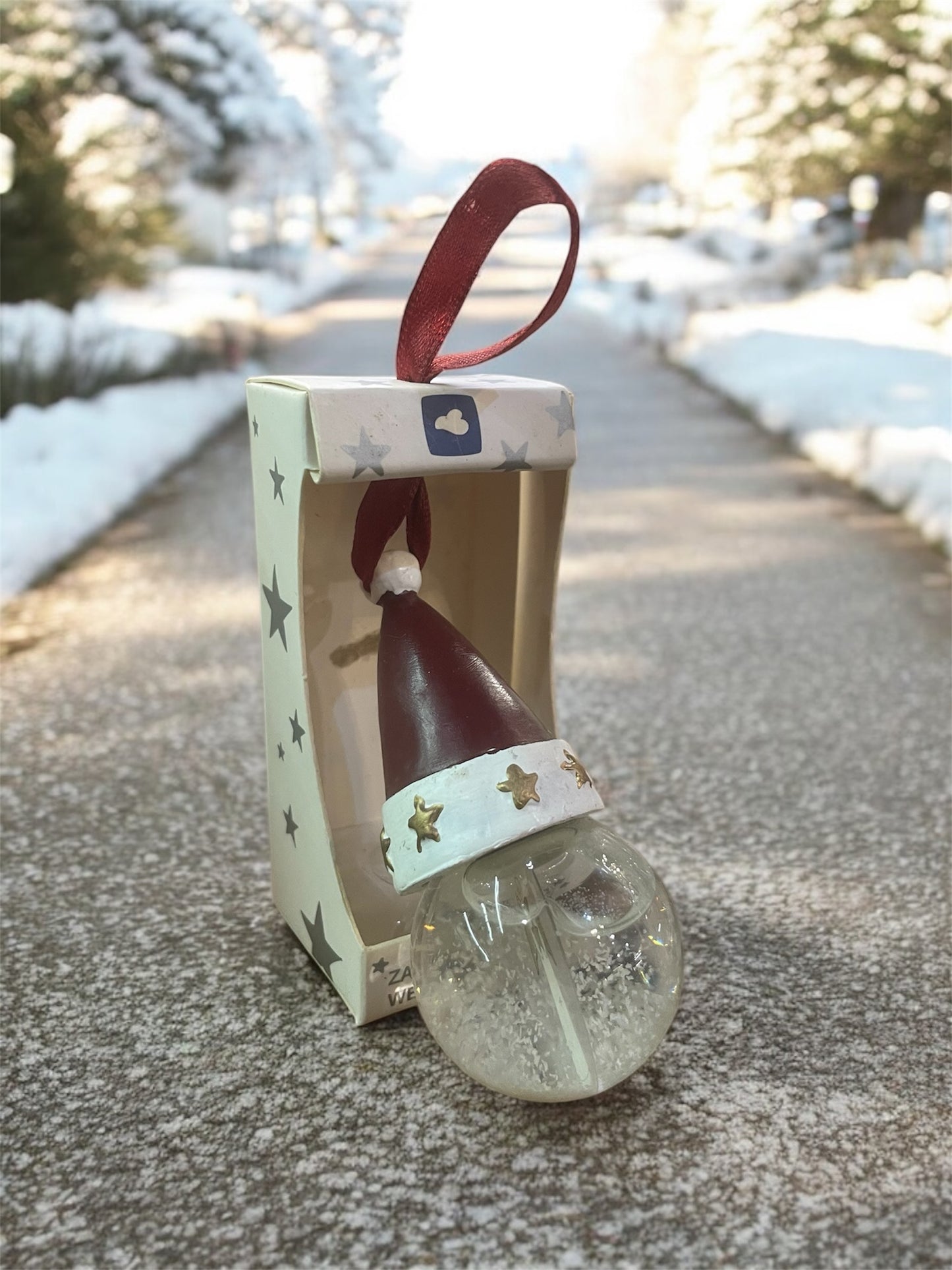 Christmas ornament with a santa hat in a gift box (8 cm)